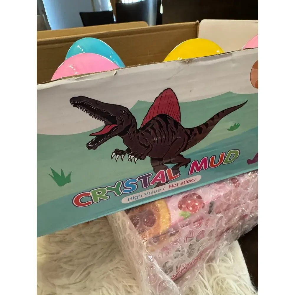 Purple slime dinosaur egg with an assorted dinosaurs inside